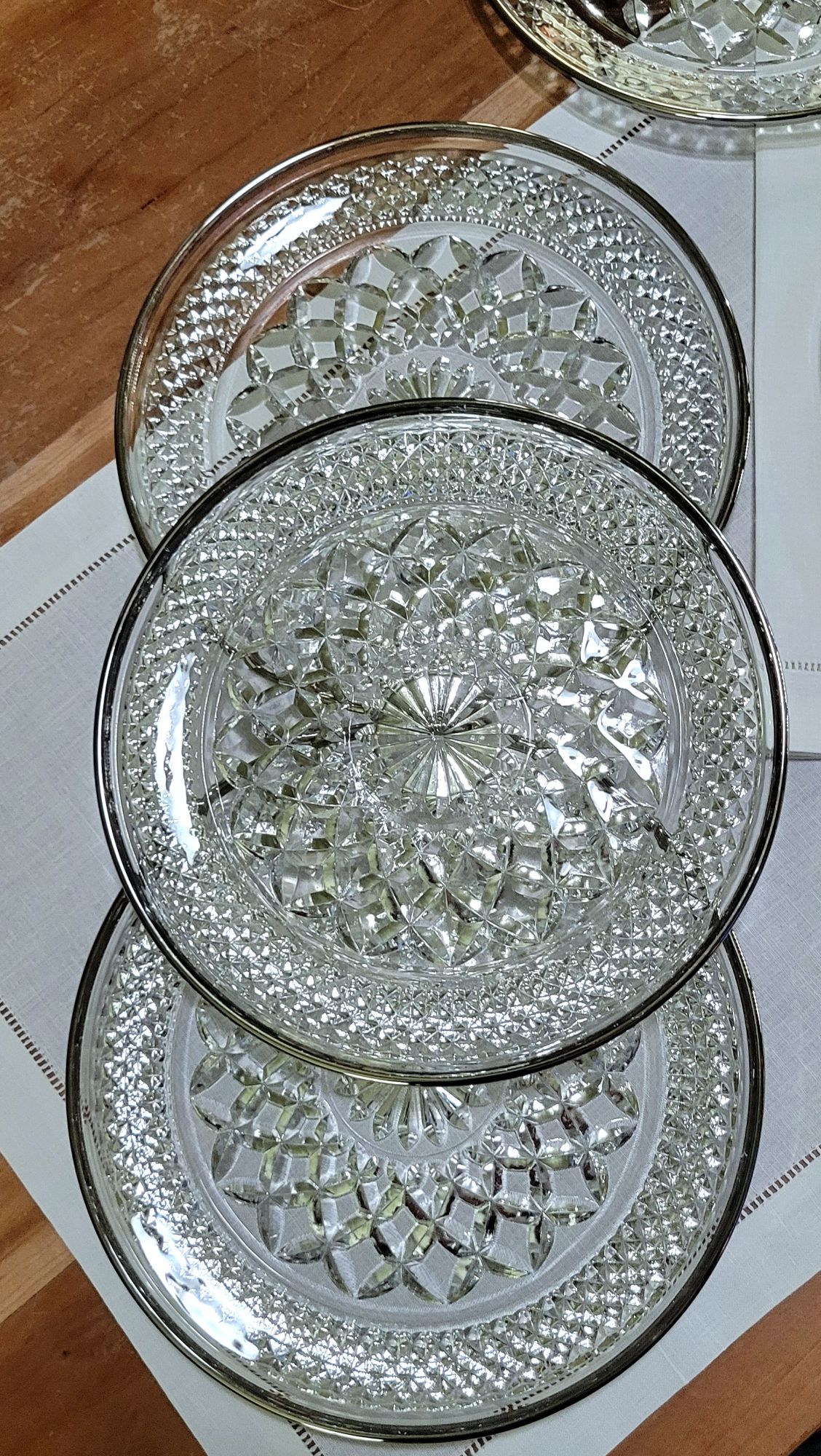 smooth-rimmed, platinum-banded eight-inch Wexford luncheon plates by Anchor Hocking. the pattern  likely sold by Tuscany Imports Ltd. under the name of Oxford.