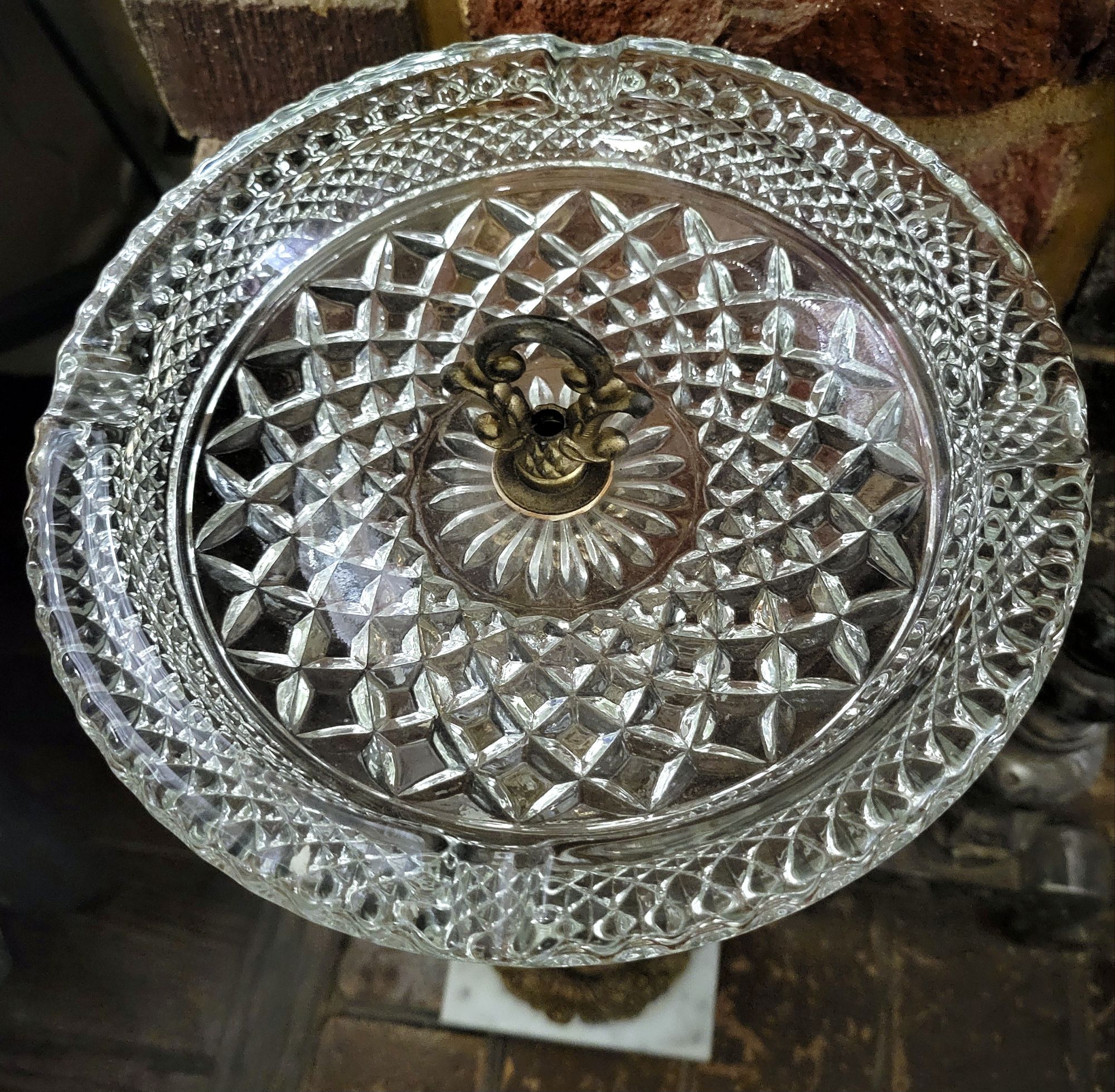 a detail shot of the large Wexford ashtray: a thick chunky pressed glass piece.