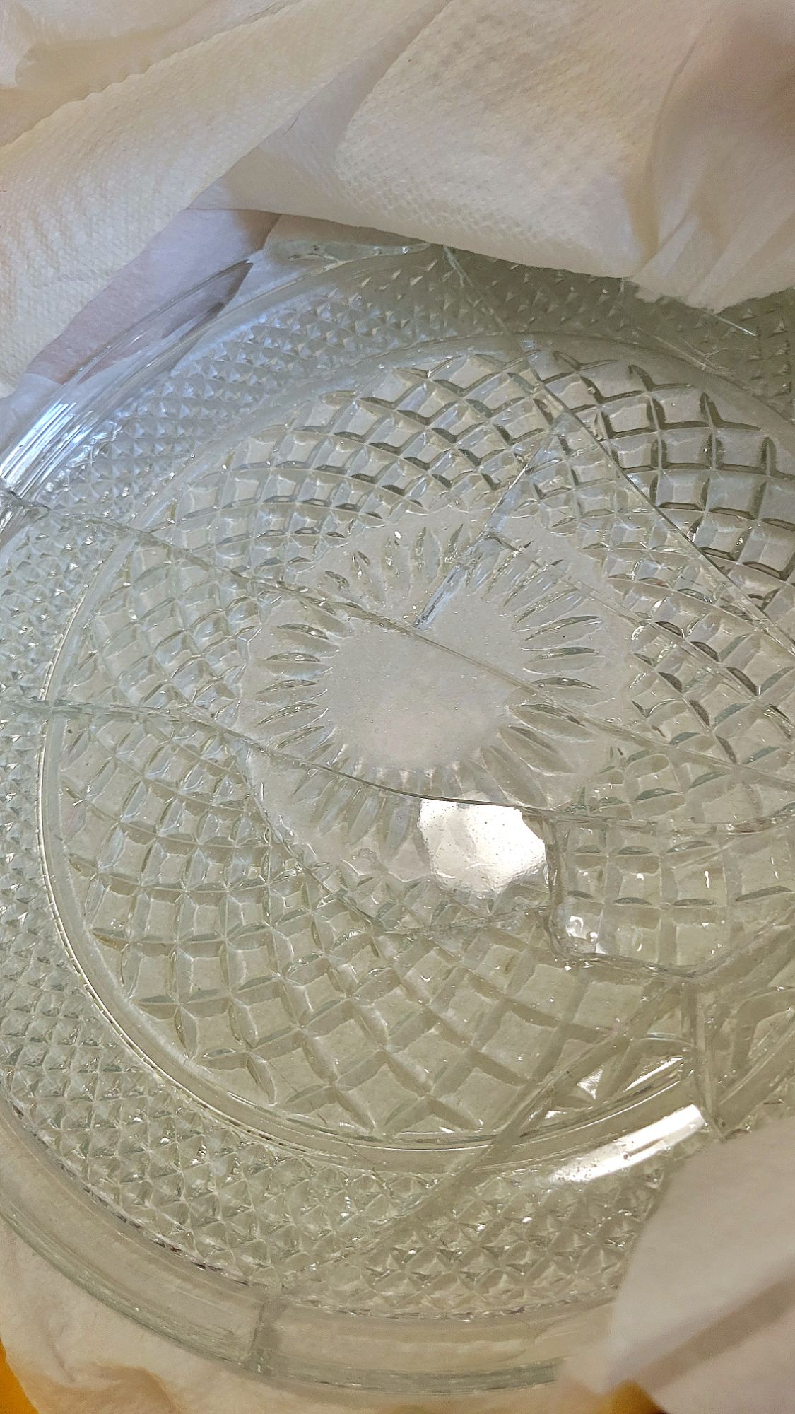 image of a shattered Wexford cake plate due to poor packing.