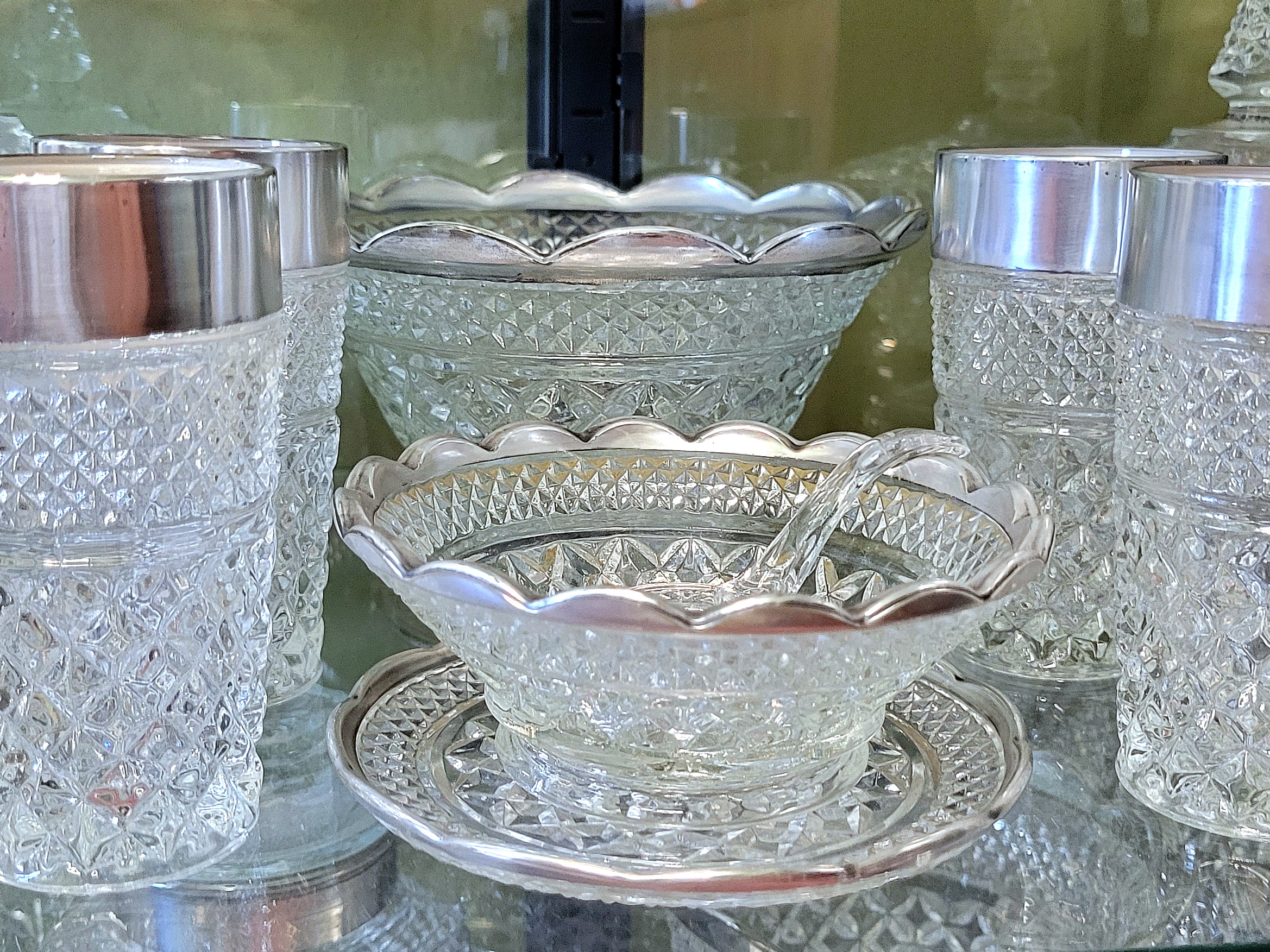 the same Wexford scalloped bowls and dessert plates as in the stilllife above, except now polished, flanked by recently acquired (and polished) silver-trimmed beverage tumblers.