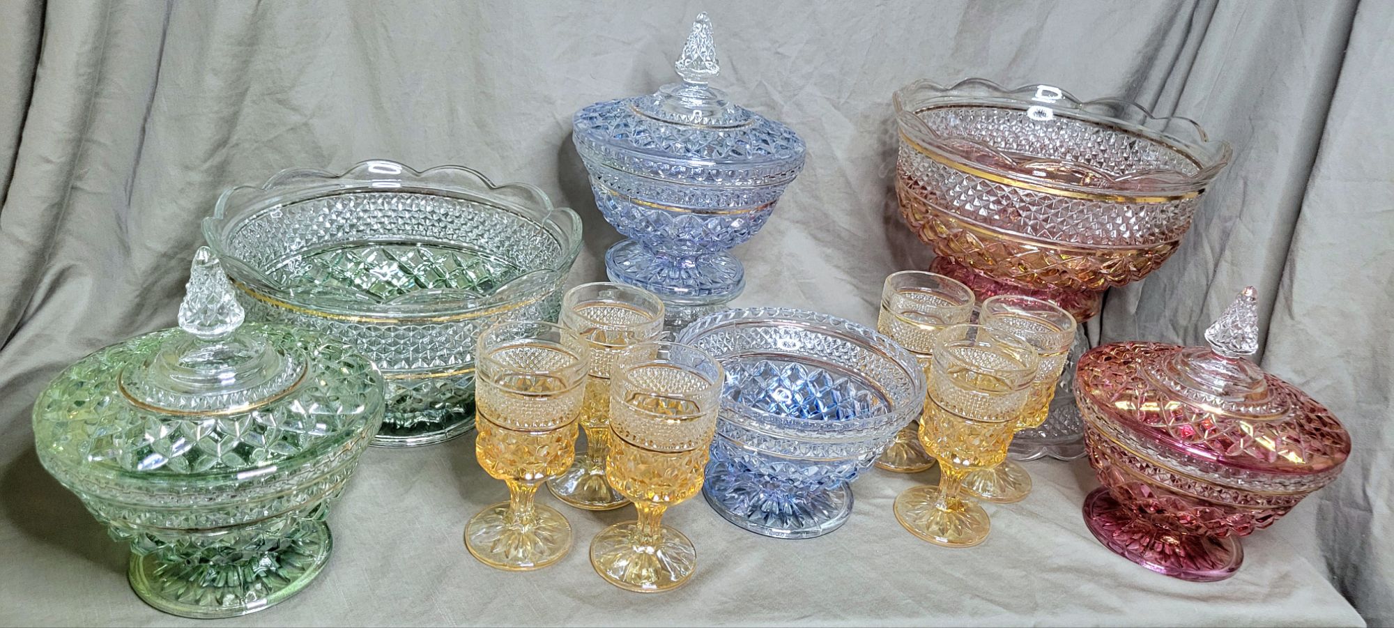 the same collection of pieces, seen from slightly higher, showing more of the top/inner views.